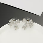 18K  Chanel Bow Tie Diamond Earrings