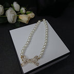 18K  Chanel Bow Pearl Necklace