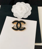 18K  Chanel Black Brooch